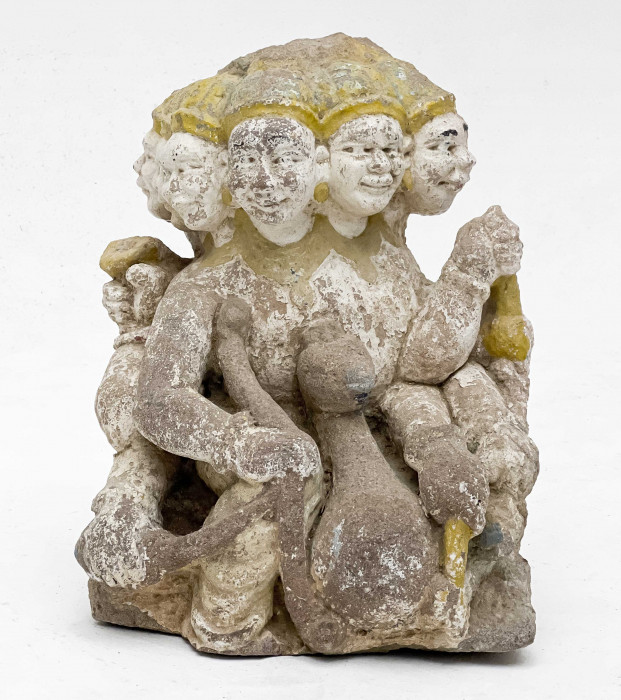 Lot 147, Indian Large Painted Stone Figural Group of Brahma, Brahma, the creator shown with multiple heads and riding a hamsa, a bird; a fragment from a larger sculpture