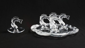 Image for Lot Lalique Crystal - Group of Four (4) Goujon Leaping Fish Card Holder (1) Fish Coupe Scalloped Dish Platter (1) Goujon Leaping Fish Ring Tray