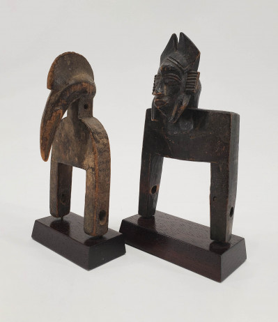 Image for Lot African - Two Figural Hedley Pulleys