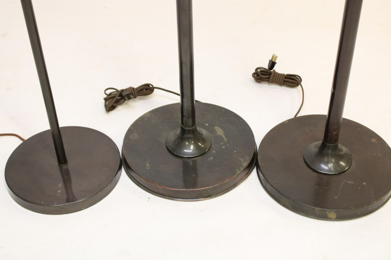 3 Patinated Metal Floor Lamps