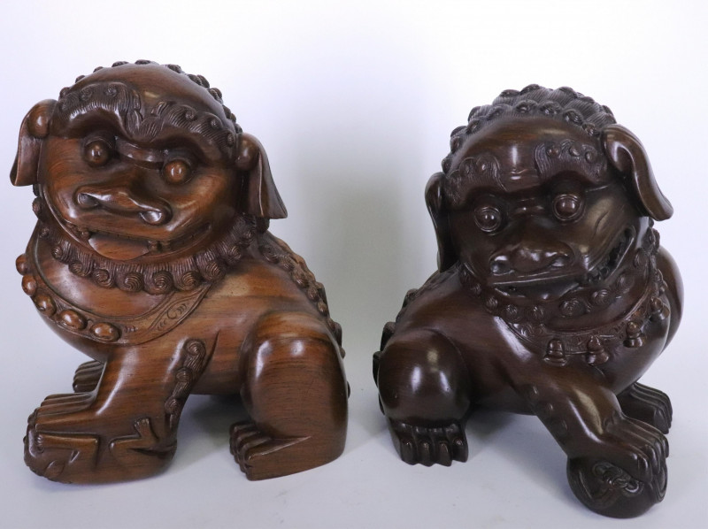 Matching Hardwood Stands with two Carved Foo Dogs