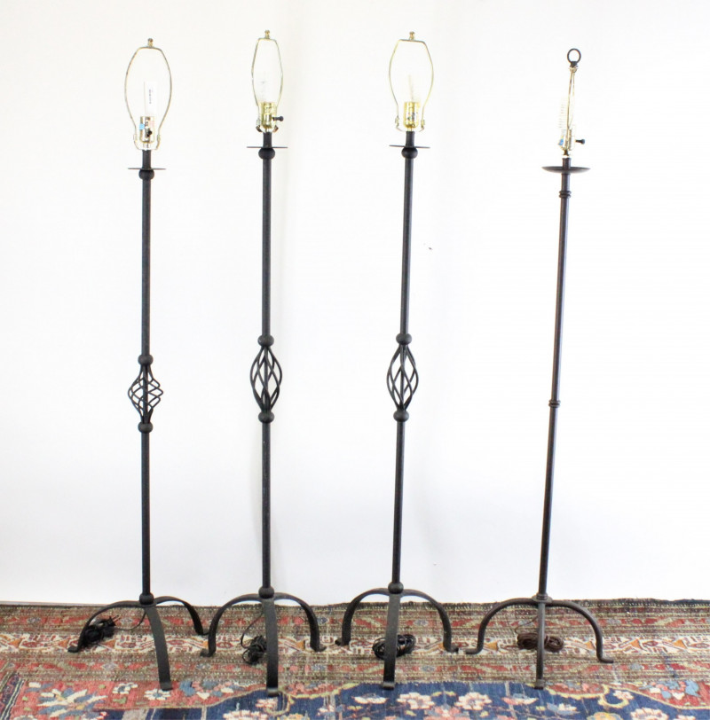 Four Black Painted Metal Floor Lamps