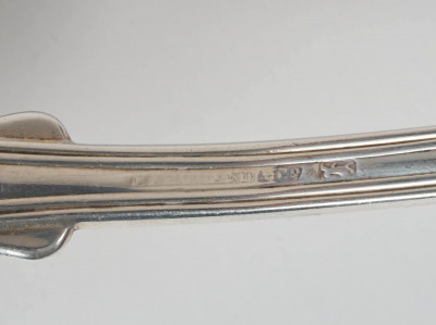 European Silversmiths - Sterling silver flatware, twenty one pieces: spoons, forks and a ladle