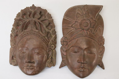 Four Cambodian Cast and Carved Heads