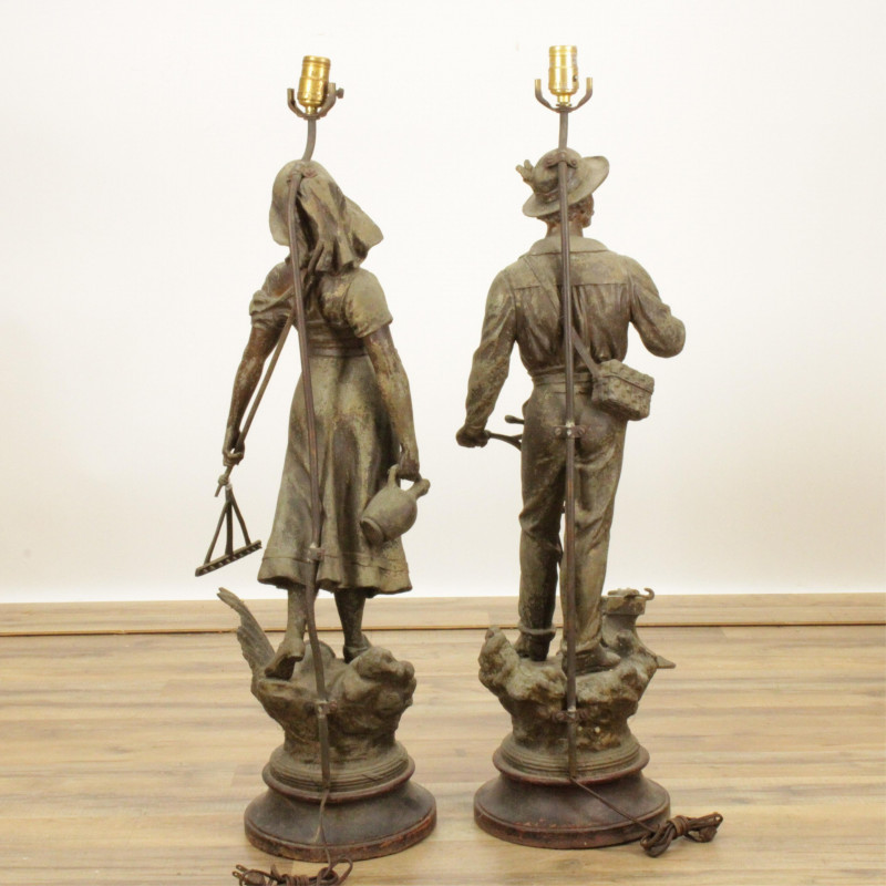 Two Metal Symbolic Agrarian Sculptural Figures