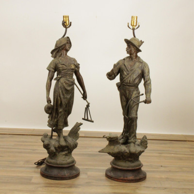 Two Metal Symbolic Agrarian Sculptural Figures