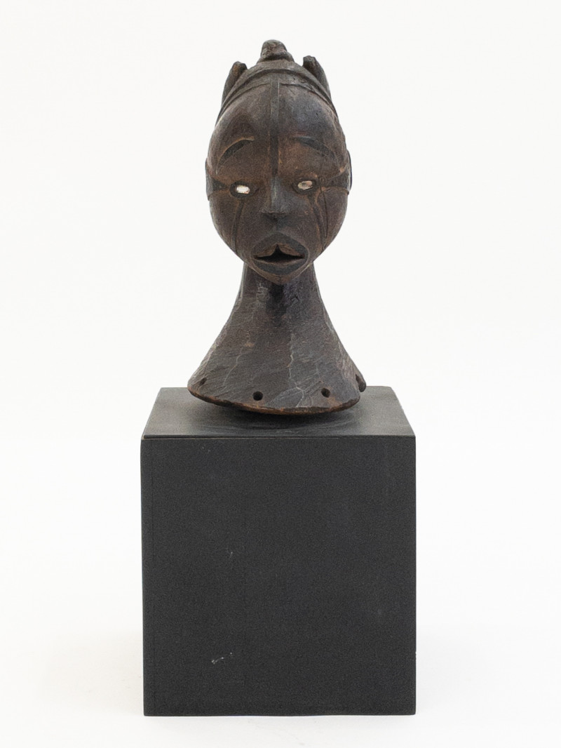 African tribal head with mirrored glass eyes