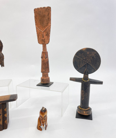 Group of 8 African figures and head rests
