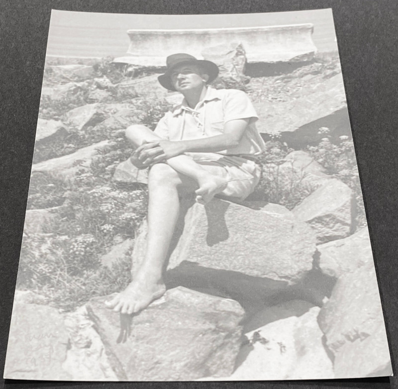 Man Ray - Paul Eluard, seated on Breakwater