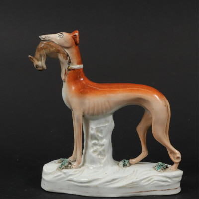 Group of 11 Staffordshire Dog Figurines
