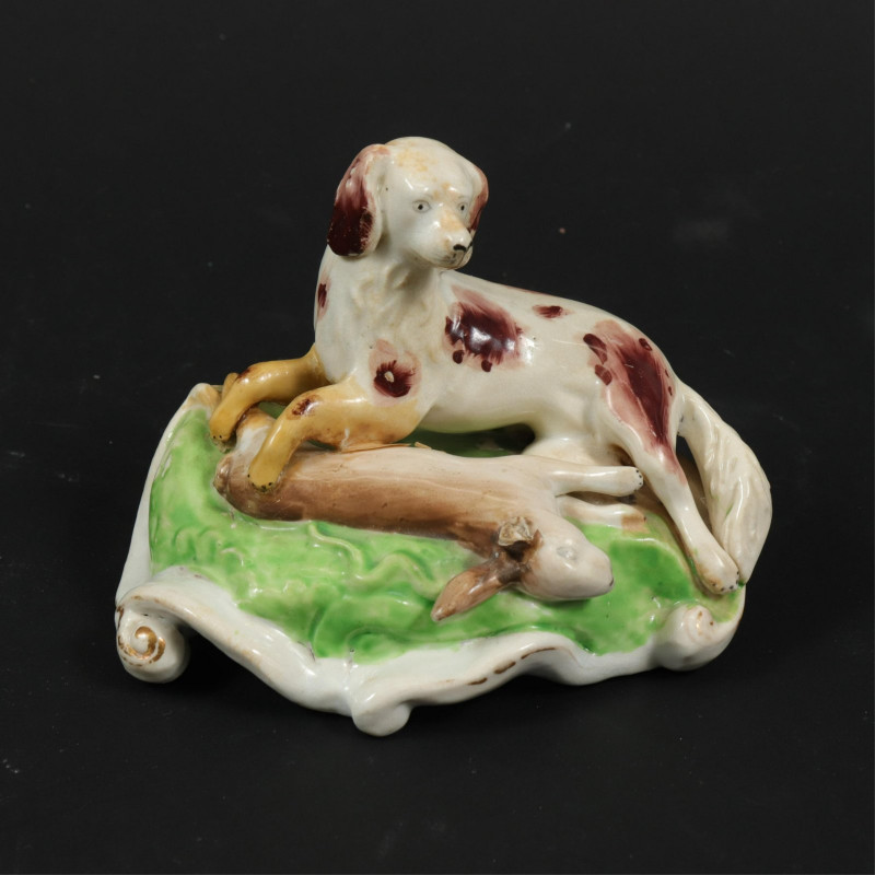 Group of 11 Staffordshire Dog Figurines