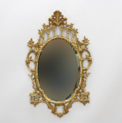 Image for Lot Oval Carved Giltwood Chippendale Style Mirror