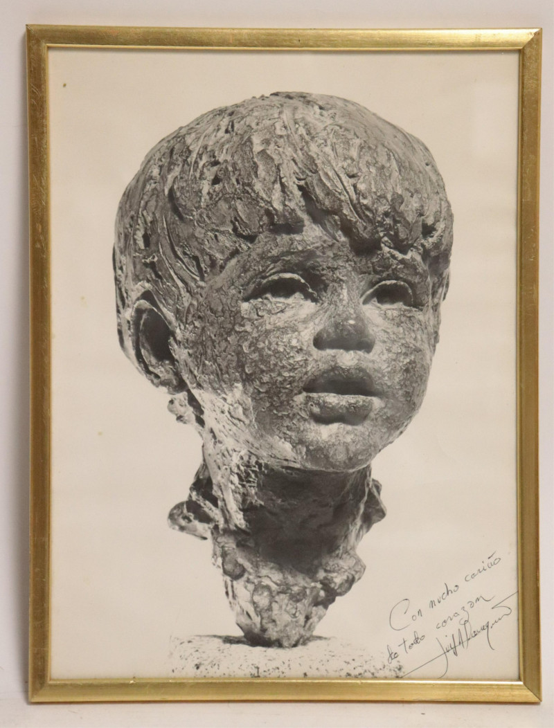 Photo of a Sculpture of a Boy's Head