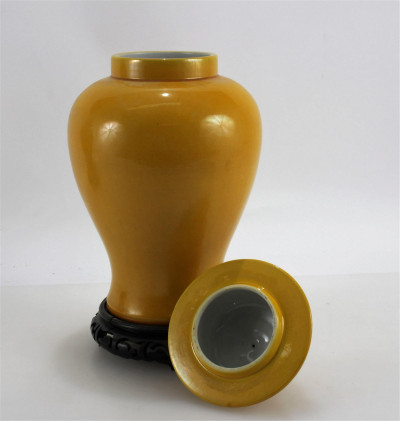 Pair of Chinese Yellow Glazed Lidded Temple Jars