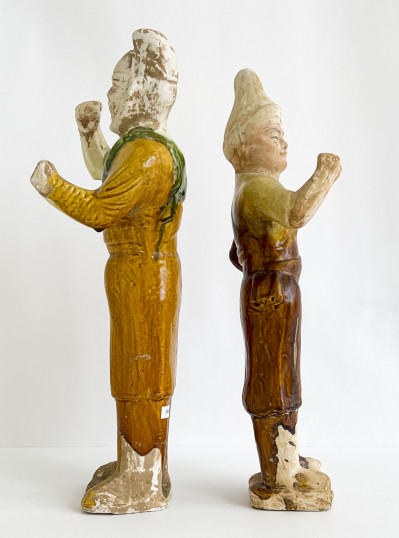 Two Chinese Sancai and Green Glazed Figures of Grooms