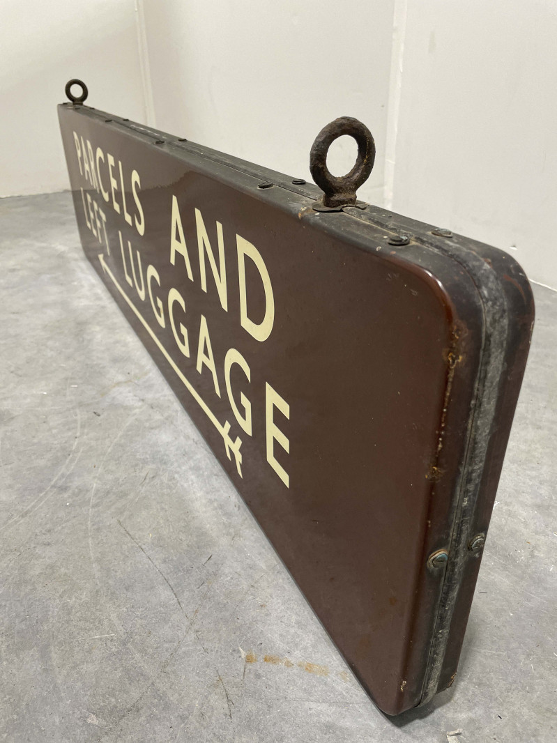 Parcels and Left Luggage Enameled Metal Sign