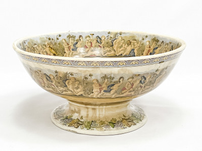 Large Footed Earthenware Punch Bowl with Cherub Motif