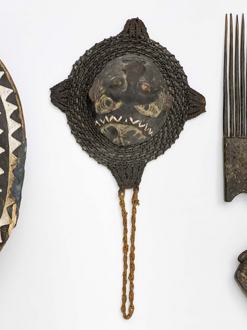 African Masks and Large Comb, Group of 3