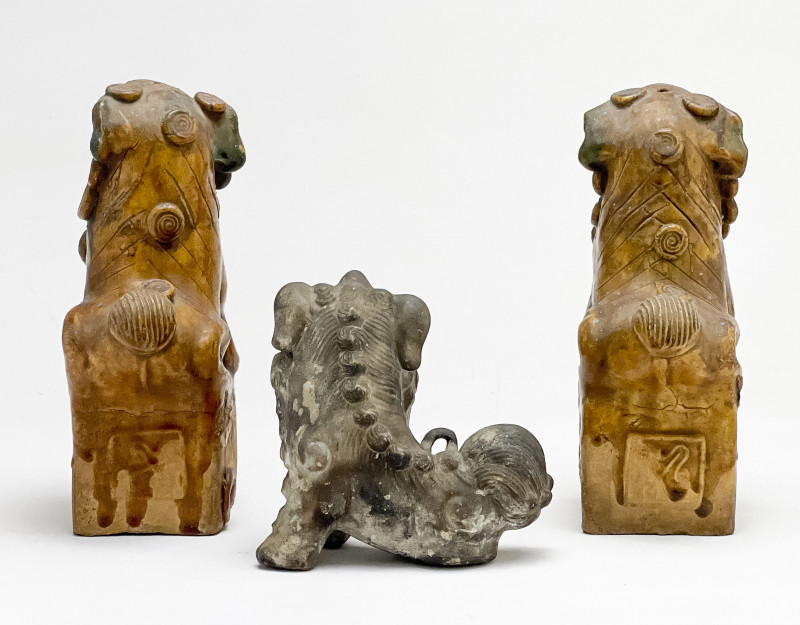 Pair of Chinese Glazed Ceramic Buddhist Lions and a Small Lion