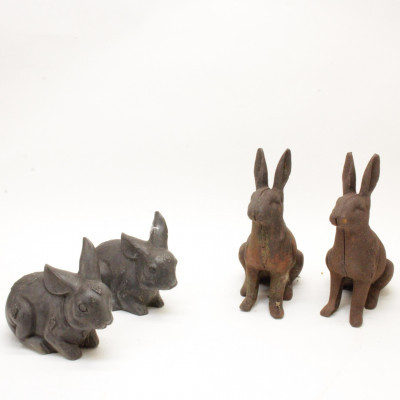 4 Cast Iron Rabbits variously sized