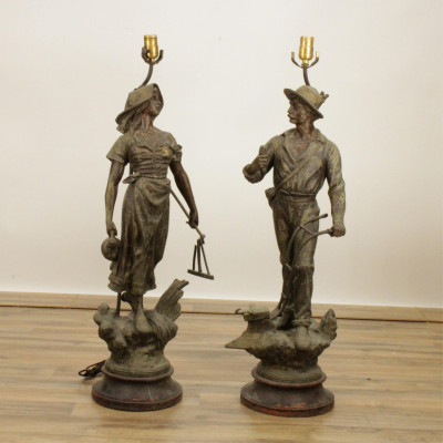 Image for Lot Two Metal Symbolic Agrarian Sculptural Figures