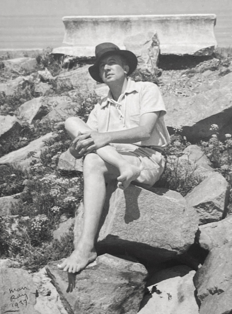 Man Ray - Paul Eluard, seated on Breakwater