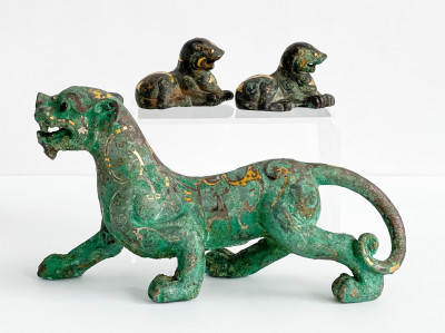Three Chinese Gold Inlaid Bronze Figures of Lions