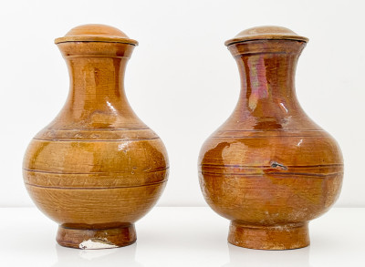 Two Chinese Brown Glazed Hu Formed Vessels and Covers