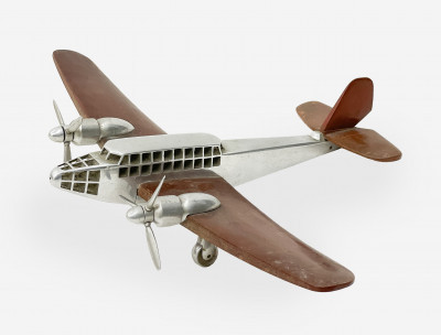 Title Aluminum & Wood Model of an Airplane / Artist