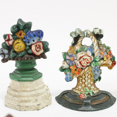 Image 3 of lot 10 Cast Iron Doorstops; floral baskets, windmill