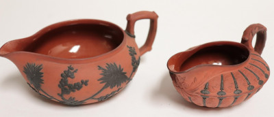 Image 2 of lot 2 Wedgwood Rosso Antico Creamers