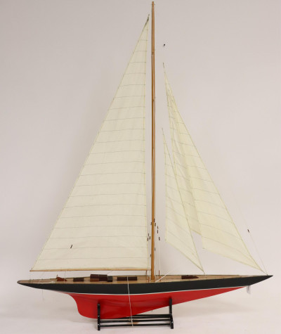 Image for Lot Model of a Red & Black Painted Sailboat on Stand
