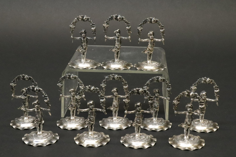 Image 1 of lot 12 Putti Figure German Sterling Place Card Holders