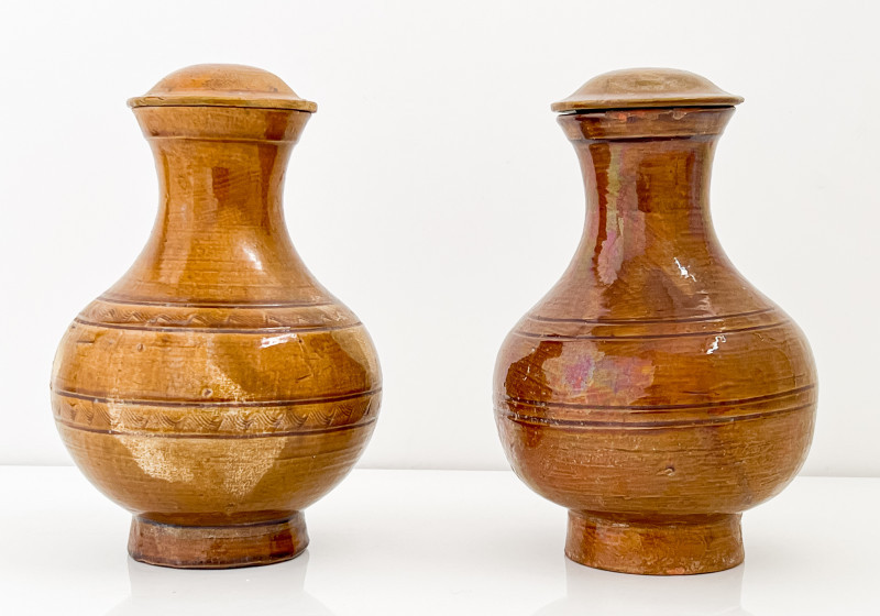 Two Chinese Brown Glazed Hu Formed Vessels and Covers