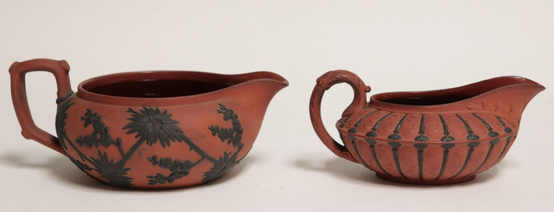 Image 1 of lot 2 Wedgwood Rosso Antico Creamers