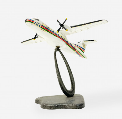Title Enameled Model of an Aerospatiale Aeritalia ATR 42 Airplane / Artist